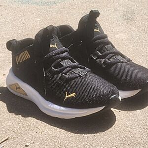 Puma Black and Gold Athletic Shoes